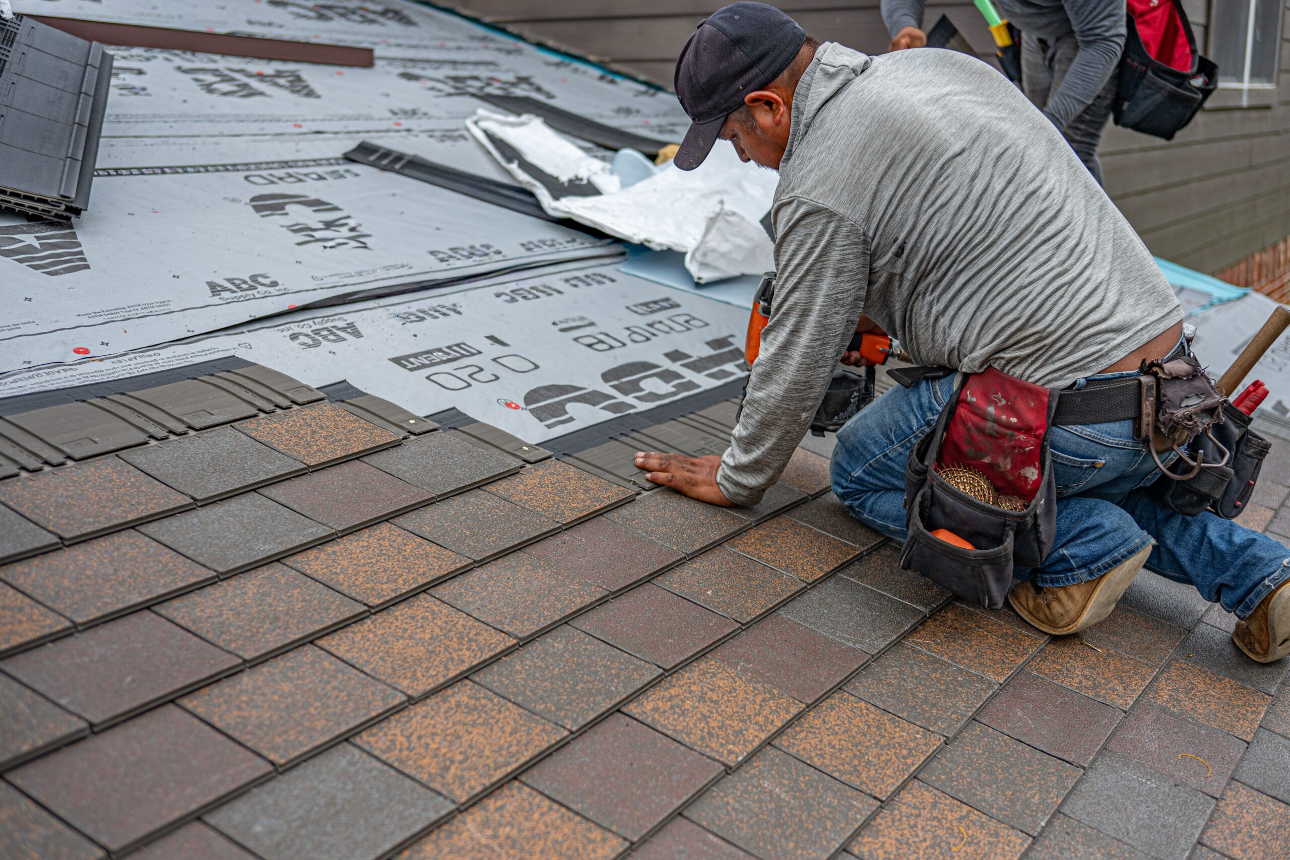 Roofing crew working on a job site